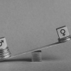 Scales representing gender pay gap