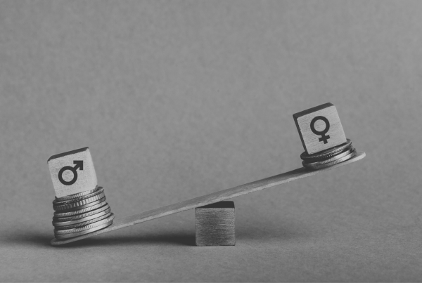 Scales representing gender pay gap
