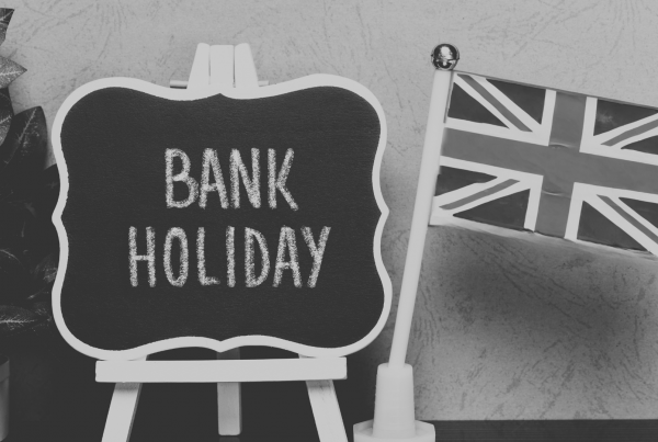 Sign with Bank Holiday written in chalk next to a small Union Jack flag