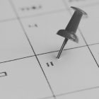 Push pin in a calendar - pushed into the 11th