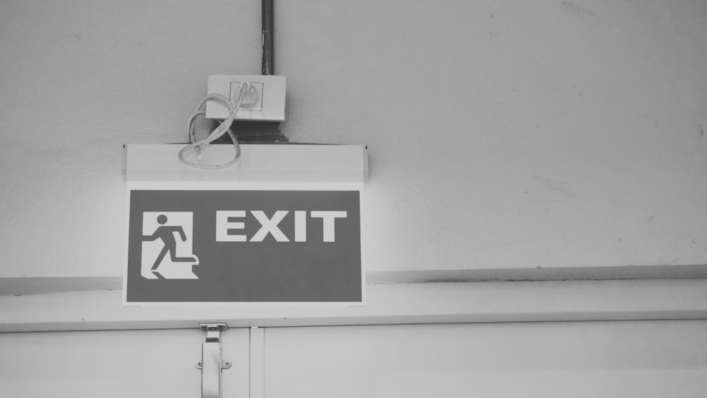 Exit sign above door