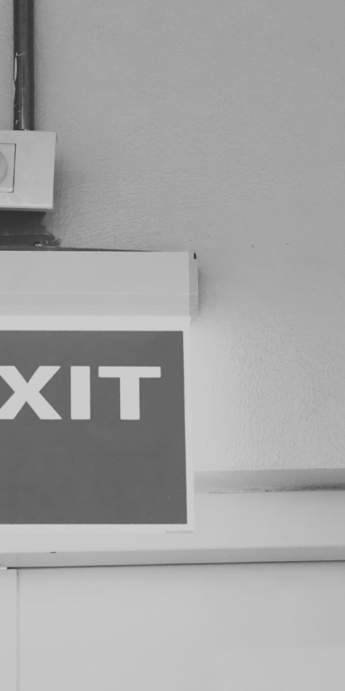 Exit sign above door