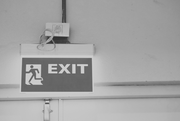 Exit sign above door