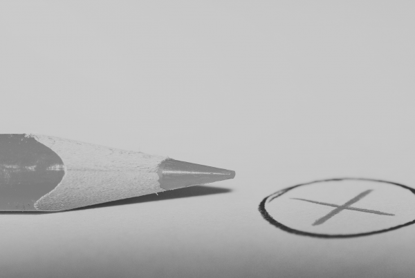 Pencil next to circle with X within the circle to show that it's an error