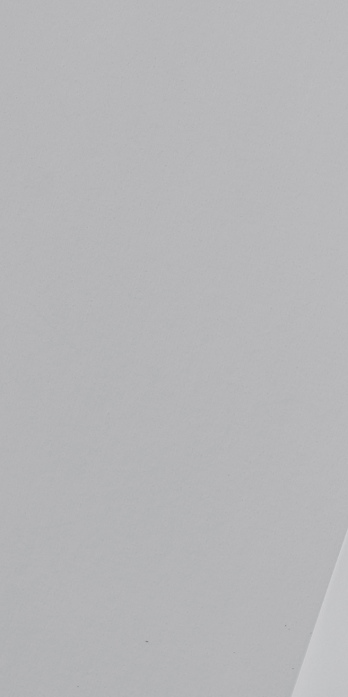 White paper with three boxes and a tick in one box