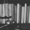 Gavel, scales and legal books